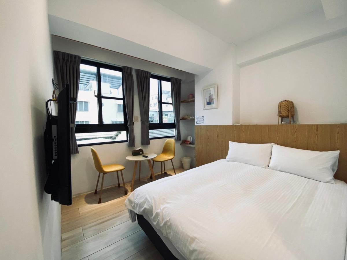 良文旅 Ryou Hotel Тайнань Экстерьер фото